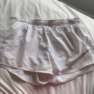 White nike running shorts